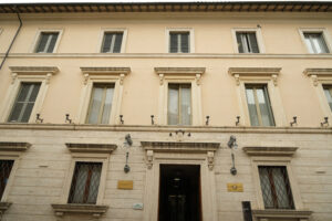 Facade of the building that houses the Cassa di Risparmio di Foligno Foundation. Travertine marble cladding. - MyVideoimage.com