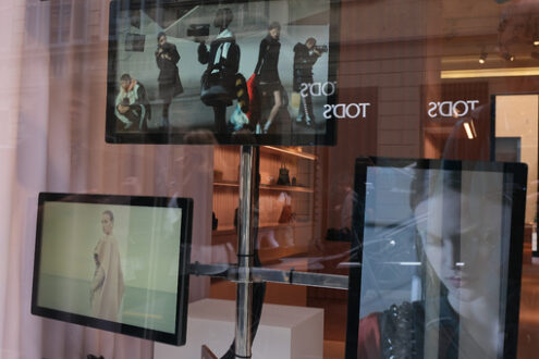 Fashion boutique with shop windows on Via Montenapoleone in Milan - MyVideoimage.com | Foto stock & Video footage