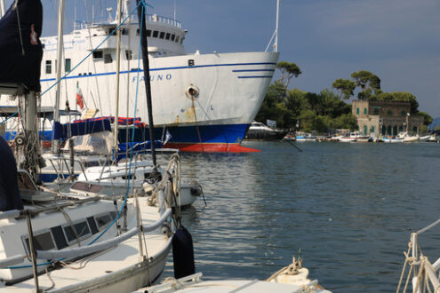 Ferry boat enters the port. The port of Ischia is housed in an a - MyVideoimage.com