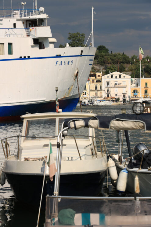 Ferry boat enters the port. The port of Ischia is housed in an a - MyVideoimage.com