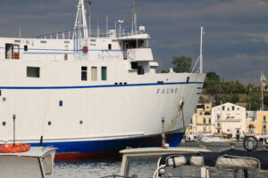 Ferry boat enters the port. The port of Ischia is housed in an a - MyVideoimage.com