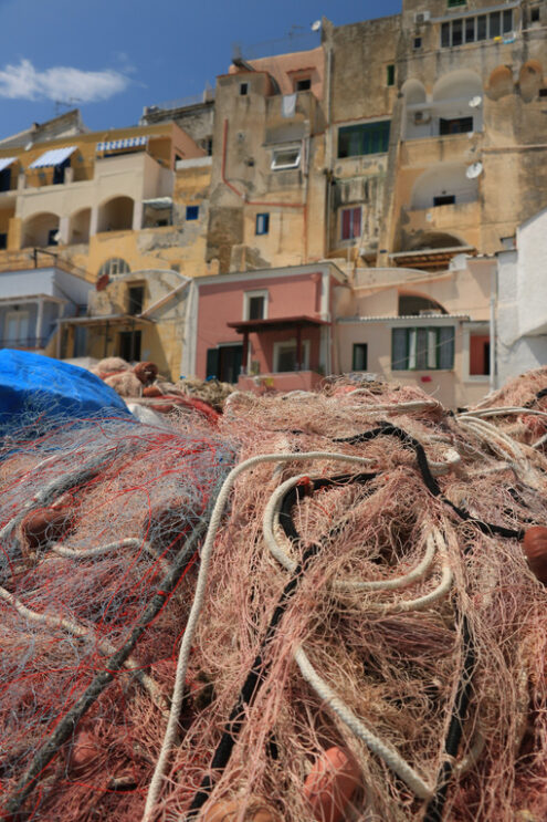 Fishing net on the dock. Fishing net on the dock of the port of Corricella, Procida. - MyVideoimage.com | Foto stock & Video footage