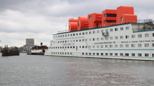 Floating hotel in Amsterdam NDSM. The BOTEL ship is moored . Foto navi. Ships photo.