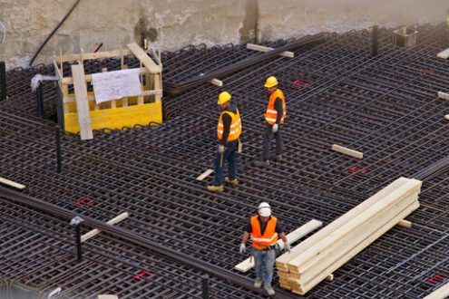 Fondazioni cemento armato Construction site for new construction in the Business District area. Photo stock royalty free. - MyVideoimage.com | Foto stock & Video footage