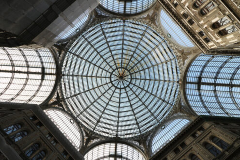 Galleria Umberto in Naples. On the ground floor it is populated by numerous and luxurious shops. The ceiling is made with a large and spectacular window. - MyVideoimage.com