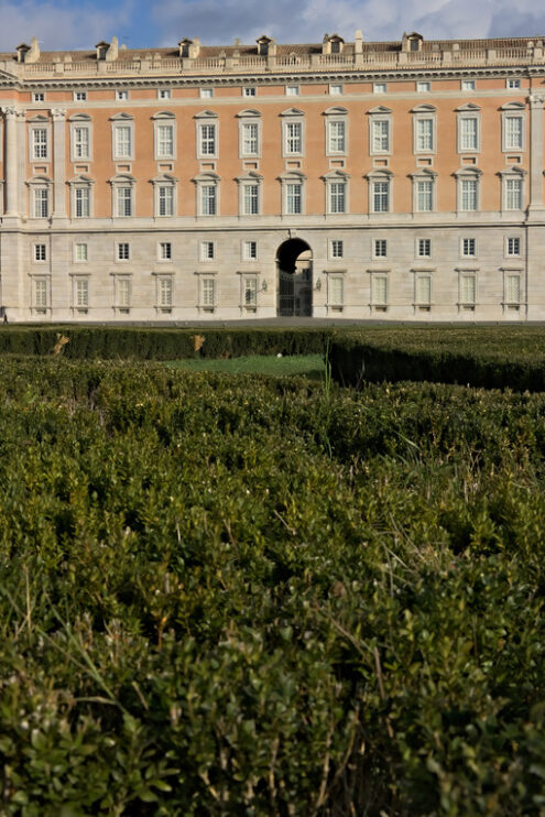 Garden in Caserta. Caserta, Italy. 27/10/2018. The external facade of the palace of Caserta. In the foreground the boxwood plants of the apio garden. - MyVideoimage.com | Foto stock & Video footage