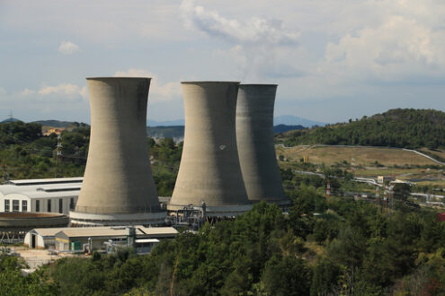 Geothermal power plant. Geothermal power plant for electricity production. Condensation. Stock free photo. - MyVideoimage.com | Foto stock & Video footage