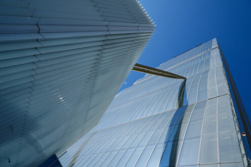 Glass building. Detail of the facade of the Allianz skyscraper by Arata Isozaki. in Milan. Contemporary architecture in the complex of the three towers at Citylife. - MyVideoimage.com | Foto stock & Video footage