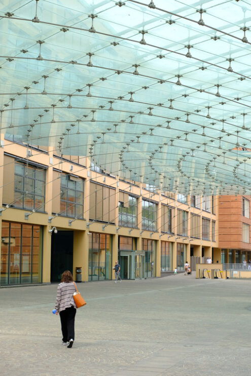 Glazed square with people walking. - MyVideoimage.com | Foto stock & Video footage