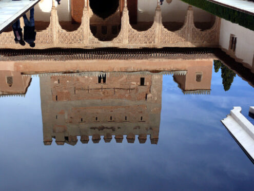 Granada, Spain. Facade reflections on a water basin in the Alhambra. Granada foto. Granada photo