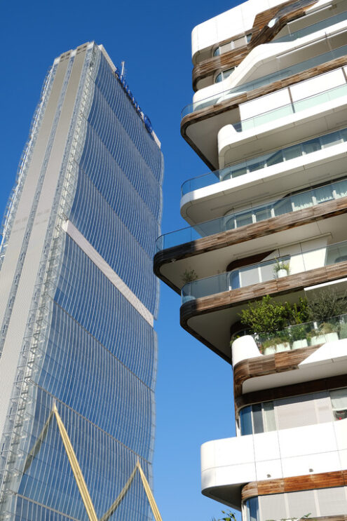 Grattacielo Allianz a Milano. Allianz insurance skyscraper and buildings with residential houses designed by Zaha Hadid in Milan Citylife. - MyVideoimage.com | Foto stock & Video footage