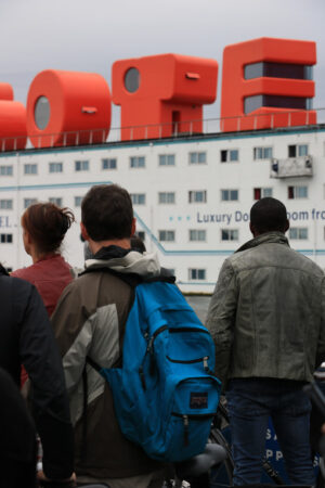 Group of people waiting for the ferry to NDSM. On the hotel back - MyVideoimage.com