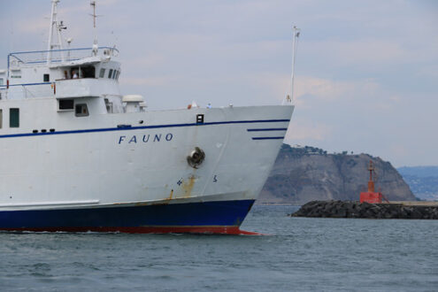 Gulf of Naples. Ferry boat in the Gulf of Naples. In the background, the seaside - MyVideoimage.com | Foto stock & Video footage