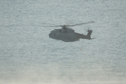 Helicopter. Helicopter on a rescue mission at sea during exercise. Stock photos. - MyVideoimage.com | Foto stock & Video footage