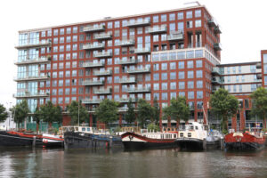 Houseboats and contemporary architecture in Amsterdam. Boats con - MyVideoimage.com