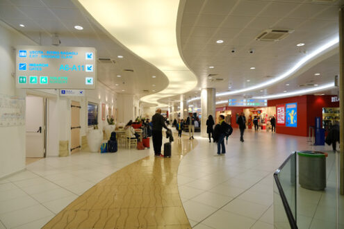 Interior of Bari airport. People leaving waiting for boarding on the plane. - MyVideoimage.com