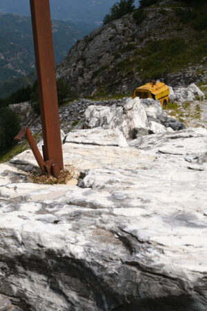 Iron pole. Iron pole stuck in a block of white marble in the quarries. Stock photos. - MyVideoimage.com | Foto stock & Video footage