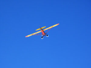 Jungfrau, Switzerland. 08/06/2009. Tourist plane in the blue sky. Foto aereo. Airplane photos