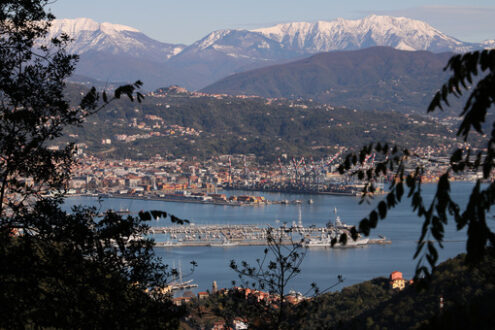 La Spezia panorama. Panoramic view of La Spezia in Liguria shot from above. A cruise ship in the port. - MyVideoimage.com | Foto stock & Video footage