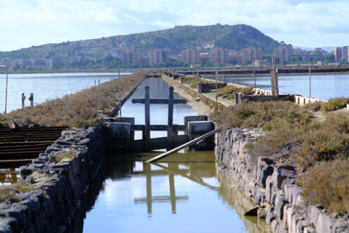 Lagoon channel in Cagliari. Molentargius park with salt flats. Stock photos. - MyVideoimage.com | Foto stock & Video footage