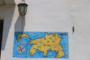 Map painted. Map of the Island of Procida painted on the facade of a house. A - MyVideoimage.com | Foto stock & Video footage