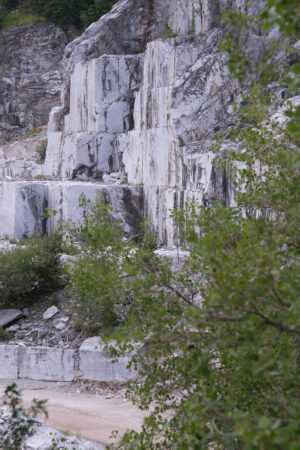 Marble wall. Wall of a white marble quarry under the mountain. Stock photos. - MyVideoimage.com | Foto stock & Video footage