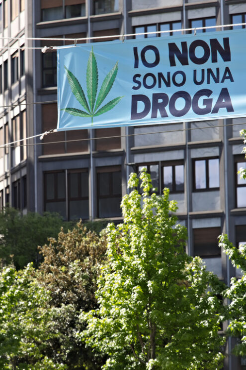 Marijuana sign. Banner in favor of Marijuana exhibited in Milan. - MyVideoimage.com | Foto stock & Video footage