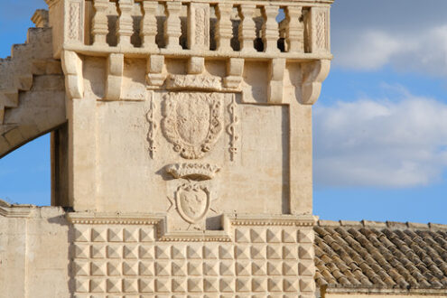 Materdomini church Matera. Materdomini Church in Piazza Vittorio Veneto of Matera. Built flat bell tower with balustrade in beige tuff. - MyVideoimage.com | Foto stock & Video footage