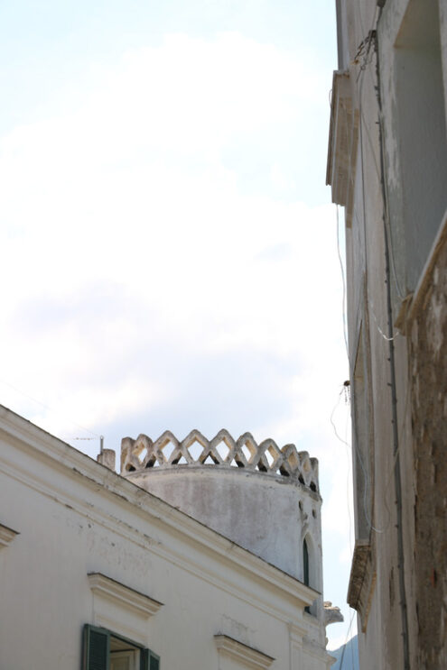 Mediterranean style house with turret on blue sky. On the island - MyVideoimage.com