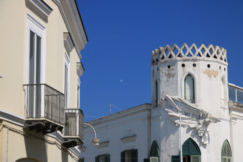 Mediterranean style house with turret on blue sky. On the island - MyVideoimage.com