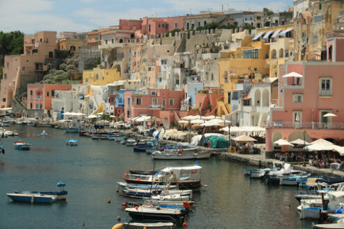 Mediterranean style. Boats anchored in the port of Corricella on the Island of Procid - MyVideoimage.com | Foto stock & Video footage