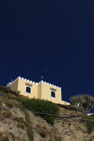 Mediterranean village on the island of Ischia. Near Sant’Angelo. The houses are built on volcanic rocks. - MyVideoimage.com