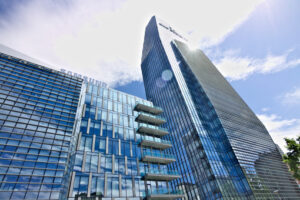 Milan business district. Diamond tower, modern buildings with curtain wall facades in glass. - MyVideoimage.com | Foto stock & Video footage