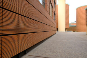 Modern  brick building. Modern building with terracotta brick facade. Stock photos. - MyVideoimage.com | Foto stock & Video footage