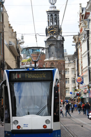 Modern tram in the center of Amsterdam, front view with the towe - MyVideoimage.com