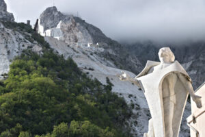 Monumento al cavatore. Colonnata. Marble quarries in Colonnata and monument to the quarryman.  The town is famous for the lardo di Colonnata and for the extraction of the white Carrara marble. Colonnata, Carrara, Tuscany, Italy. - MyVideoimage.com | Foto stock & Video footage