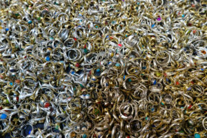 Mountain of silver rings with stones. - MyVideoimage.com