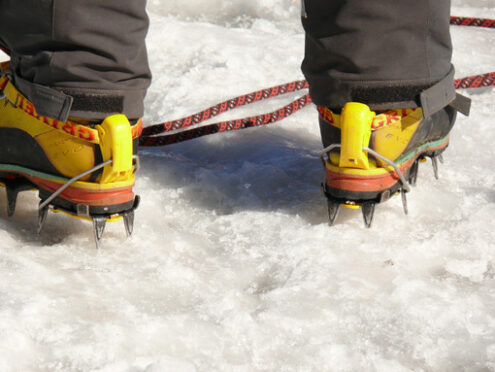 Mountaineer with crampons - MyVideoimage.com