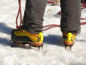 Mountaineer with crampons - MyVideoimage.com