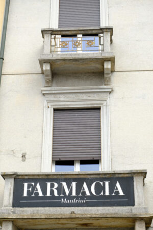 Old Pharmacy sign. Pharmacy sign on the balcony of a building.  Stock photos. - MyVideoimage.com | Foto stock & Video footage