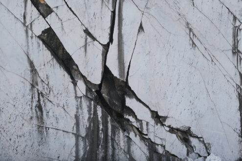 Old marble texture. Carrara white marble wall. Rough natural marble surface in a quarry. Stock photos. - MyVideoimage.com | Foto stock & Video footage