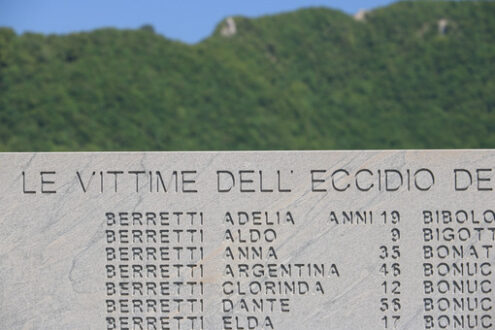 Ossuary monument of Sant’Anna di Stazzema. Nazi massacre of 12 August 1944.  Plaque with the list of victims of the massacre. - MyVideoimage.com