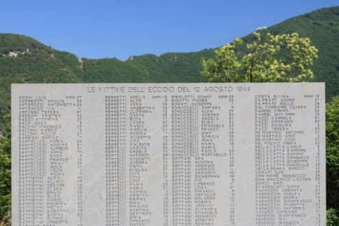 Ossuary monument of Sant’Anna di Stazzema. Nazi massacre of 12 August 1944.  Plaque with the list of victims of the massacre. - MyVideoimage.com