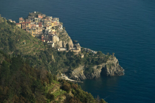 Paesaggi Cinque Terre. Corniglia. Corniglia to the Cinque Terre. Seascape at sunset time. Fog. Stock photo royalty free - MyVideoimage.com | Foto stock & Video footage