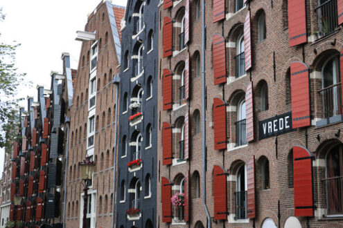 Palace windows with brick façade in Amsterdam. Vrede. - MyVideoimage.com