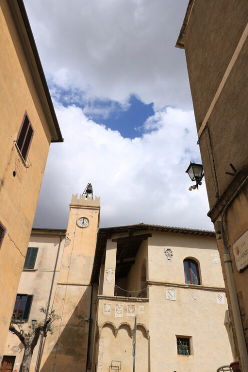 Palazzo del Podestà with bell tower and noble coats of arms and - MyVideoimage.com