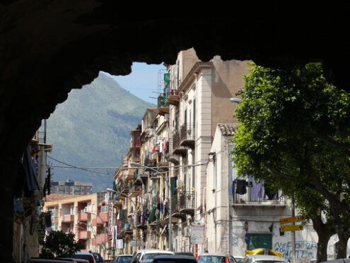 Palermo, Sicily, Italy. Popular road with mountain frond. - MyVideoimage.com | Foto stock & Video footage