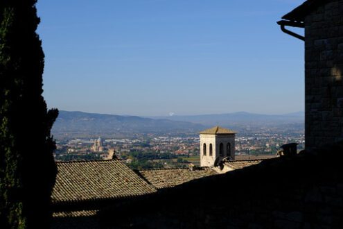 Panorama of the Assisi countryside with churches, houses and trees. From the top of the city you can enjoy a splendid panoramic view of the valley. - MyVideoimage.com