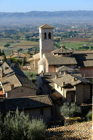 Panorama of the Assisi countryside with churches, houses and trees. From the top of the city you can enjoy a splendid panoramic view of the valley. - MyVideoimage.com