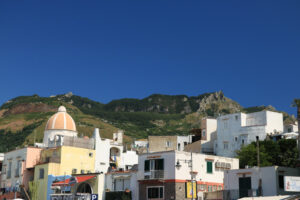 Panorama of the town of Forio d’Ischia, near Naples. 	Dome of the church of San Gaetano. The mountain and the blue sky. - MyVideoimage.com